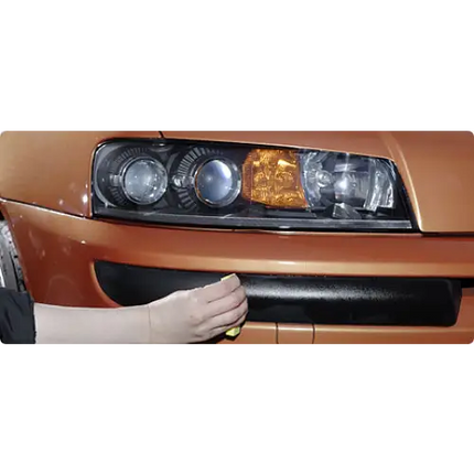 Aplicación de Sellador de Plásticos Nano Hard Soft99 sobre piezas plásticas de automóvil.